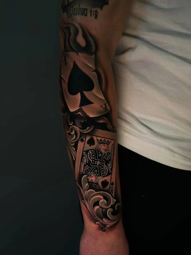 Black and grey poker tattoo